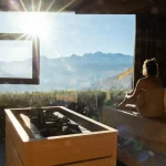 Woman sitting in a Sauna in the alps